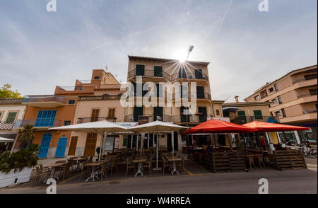 ALCUDIA, SPAIN - JULY 7, 2019: House and alley of the old town are seen on July 7, 2019 in Alcudia, Spain. Stock Photo