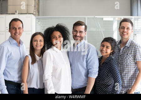 Smiling diverse office workers group, multiracial employees Stock Photo