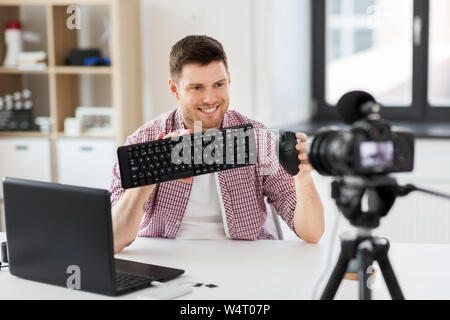 video blogger with keyboard and computer mouse Stock Photo