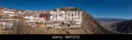 China, Tibet, Lhasa, The Ganden Monastery sits at the top of a natural amphitheater on Wangbur Mountain. It  founded in 1409 AD but was mostly destroyed in 1959 by the Chinese military  sat at the top of a natural amphitheater on Wangbur Mountain  almost 2000 feet higher than the valley at right. Stock Photo