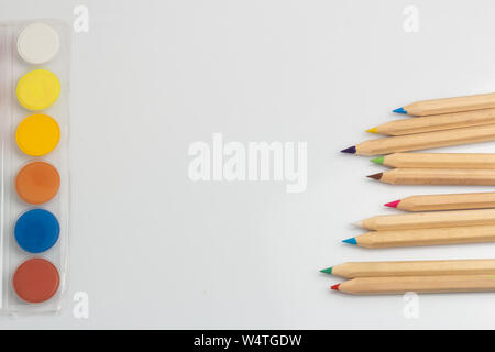 Colored pencils and pastels on a white background Stock Photo