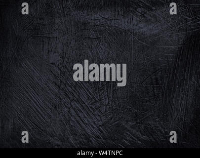 Black worn metal plate steel texture. Dark aluminum background. Stock Photo