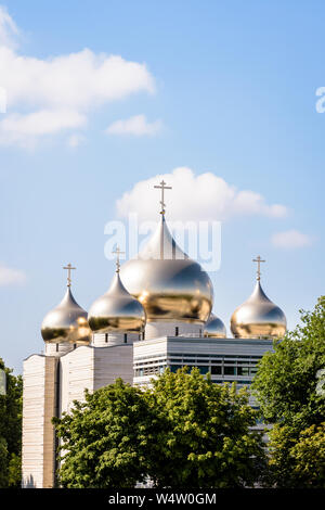 The Holy Trinity Cathedral in Paris, France, is a modern russian Orthodox cathedral, built in 2016 and topped by five golden onion domes. Stock Photo