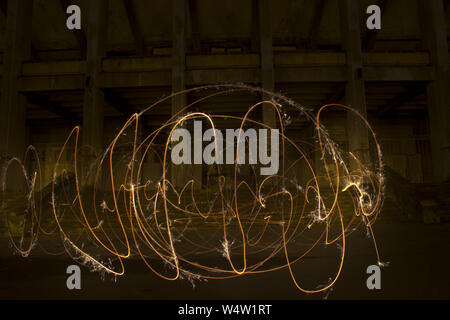 Light painting / light drawing with fire and steel wool Stock Photo