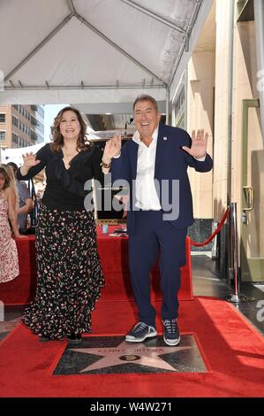 Los Angeles, CA, USA. 24th July, 2019. Kathy Najimy, Kenny Ortega at the induction ceremony for Star on the Hollywood Walk of Fame for Kenny Ortega, Hollywood Boulevard, Los Angeles, CA July 24, 2019. Credit: Michael Germana/Everett Collection/Alamy Live News Stock Photo