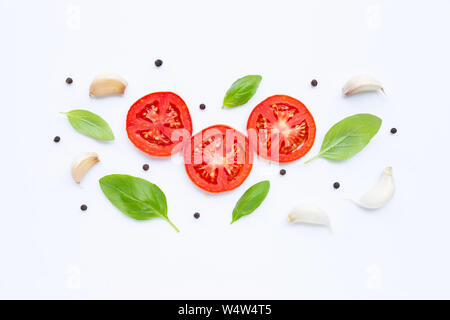 Healthy eating concept. Tomato, garlic, peppercorn and basil isolated on white background, Stock Photo