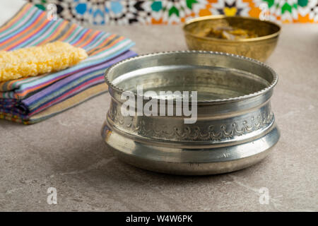 Decorated silver colored metal Hammam water bowl Stock Photo