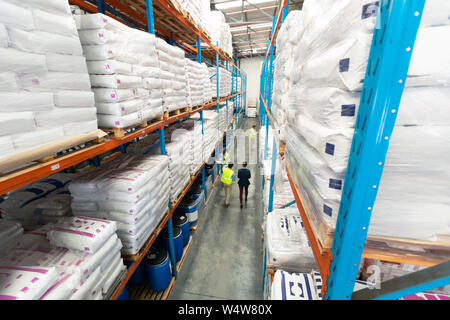 Warehouse staff working together in warehouse Stock Photo