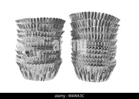 Stacks of Cupcake Holders on White Background Stock Photo