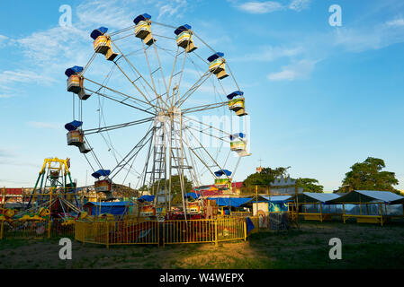 Retro style ferris wheel at a carnival in Cuertero town, Capiz Province, Philippines. Stock Photo