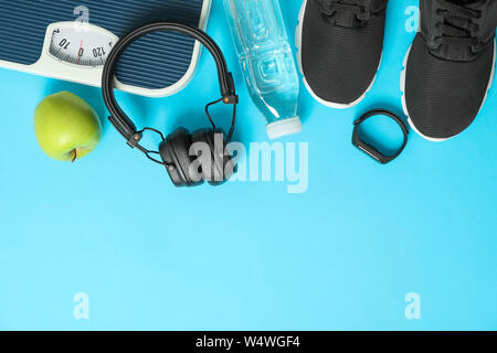 Flat lay composition with loss weigh accessories on color background Stock Photo