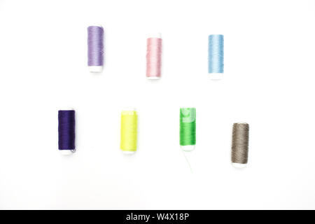 Sewing supplies on white background Stock Photo
