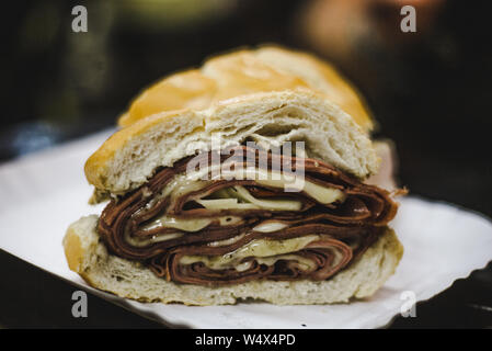 Cheese and Mortadela ham sub sandwich made famous by the food markets of Sao Paulo, Brazil Stock Photo