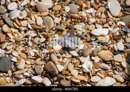multi-colored stones, colored background, colorful decorative stones, aquarium stones, garden stones, landscape design Stock Photo