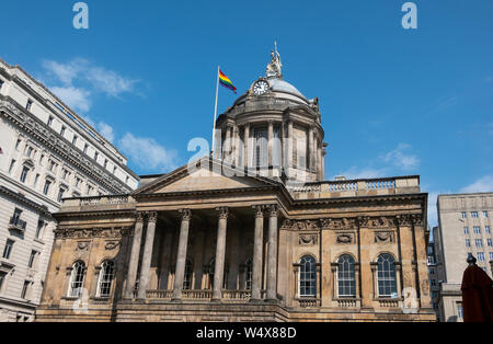 Town Hall of Liverpool, a National Heritage building, flying a LGBT Pride flag Stock Photo