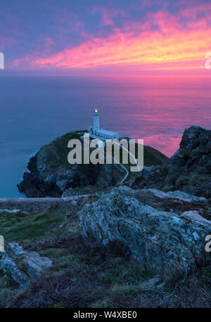 South Stack Lighthouse at sunset on Anglesey Stock Photo