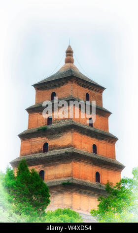 The giant wild goose pagoda or Dayan Pagoda at sunset located in Da Cien Temple complex in Xian China on an overcast day. Stock Photo