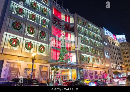 Night view of brightly illuminated facade of the flagship Macy's department store on Union Square in San Francisco, California on Christmas day, December 25, 2018. () Stock Photo