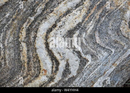 Rock with wavy pattern close up Stock Photo