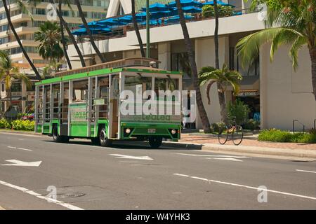 Waikiki Trolley Bus, popular transport for tourists in Waikiki, Hawaii Stock Photo