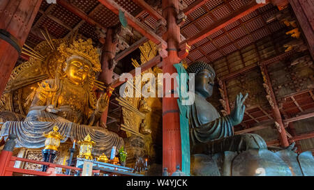 Nara, Japan - October 29 2018: Daibutsu - the great Buddha with Kokuzo Bosatsu - Chinese Goddess in Daibutsuden, the great Buddha hall at Todaiji temp Stock Photo