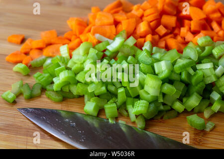 Close up on diced up carrots and celery Stock Photo