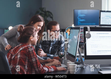Team of programmers working in office Stock Photo