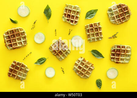 Tasty squash waffles on color background Stock Photo - Alamy