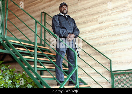 African-American security guard in building Stock Photo - Alamy