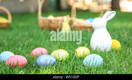 Colorful Easter eggs on grass outdoors Stock Photo