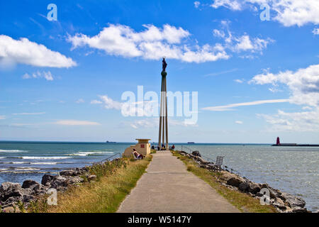 The Our Lady Star of the Sea statue in Dollymount, designed by the artist Cecil King, it is 70ft high  and was erected in 1972. Stock Photo