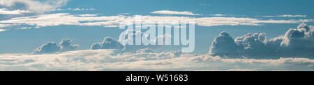 Cumulonimbus clouds against blue sky, Bavaria, Germany Stock Photo
