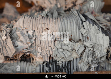 Close-up on gray ash from burnt paper in a fire Stock Photo
