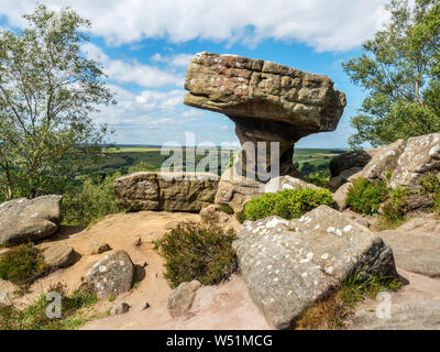 The Druids Writing Desk gritstone rock formations at Brimham Rocks near Summerbridge Nidderdale North Yorkshire England Stock Photo