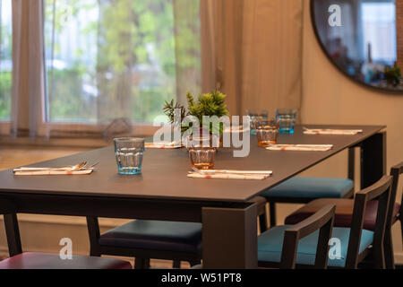 Beautiful decorated table set up for dinner at home Stock Photo