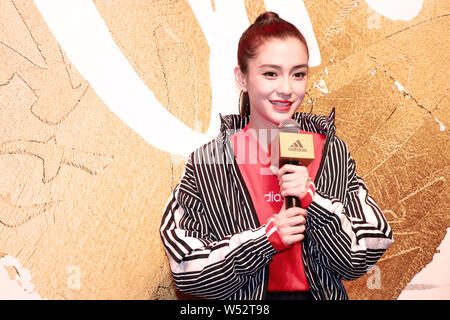 Hong Kong actress Angelababy attends a promotional event for Adidas in Shanghai, China, 11 January 2019. Stock Photo