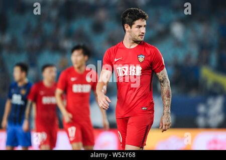 --FILE--Brazilian football player Alexandre Rodrigues da Silva, known as Pato, of Tianjin Quanjian is pictured in the 21st round match against Jiangsu Stock Photo