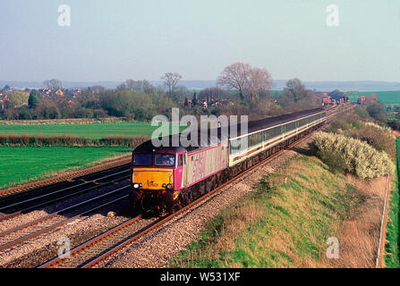 A class 57 diesel locomotive number 57601 in Porterbrook livery working a First Great Western service at Cholsey on the 28th March 2002. Stock Photo