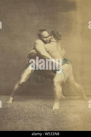 Two Japanese Sumo Wrestlers in Grappling Pose, Felice Beato (English, born Italy, 1832 - 1909), or Baron Raimund von Stillfried (Austrian, 1839 - 1911), Japan, 1868–1880, Hand-colored albumen silver print, 13.8 × 9.5 cm (5 7/16 × 3 3/4 in Stock Photo