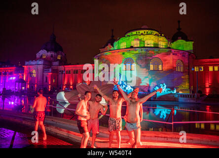 Hundreds of revellers partying at Szechenyi thermal baths in Budapest.The 109-year-old spa is taken over by revellers every Saturday night from Februa Stock Photo