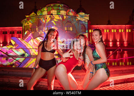 Hundreds of revellers partying at Szechenyi thermal baths in Budapest.The 109-year-old spa is taken over by revellers every Saturday night from Februa Stock Photo