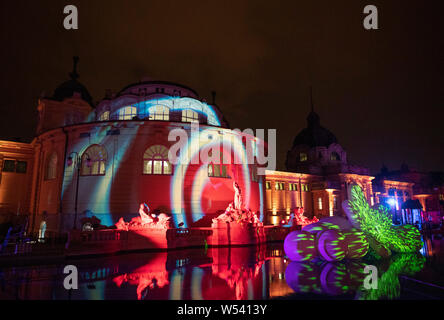 Hundreds of revellers partying at Szechenyi thermal baths in Budapest.The 109-year-old spa is taken over by revellers every Saturday night from Februa Stock Photo