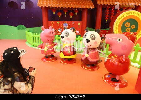 People visit the Ppeppa Pig-themed pop-up store to preheat the upcoming movie 'Peppa Celebrates Chinese New Year' in Shanghai, China, 22 January 2019. Stock Photo