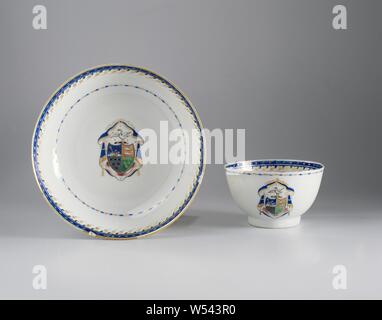 Cup with the arms of the Nolthenius family, Porcelain cup, painted on the glaze in blue, red, pink, green, black and gold. On the wall a flower branch, the coat of arms of Martinus Nolthenius (1766-1793), a VOC servant. The weapon is divided into four compartments with in 1 a sea god against a blue background, 2. two dolphins [?] Against a golden background, 3. six squares against a silver background, 4. six golden stars on a green background. The cover is in blue and gold with tassels, the helmet sign is a swan. Decorative bands around the edge and on the inner edge. Two cracks and two chips Stock Photo