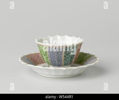 Bell-shaped cup and saucer with a putto holding a lotus branch, Bell-shaped porcelain cup and saucer with ribbed wall and scalloped edge, painted on the glaze in blue, red, pink, green, purple, black and gold. On the plate of the dish a medallion with a winged putto with a lotus branch in his hand, the wall is divided into eight compartments, each with a different pattern against alternating blue, purple or pink grounds, the boxes are separated by a gold band. Famille rose., anonymous, China, c. 1725 - c. 1749, Qing-dynasty (1644-1912) / Yongzheng-period (1723-1735) / Qianlong-period (1736 Stock Photo
