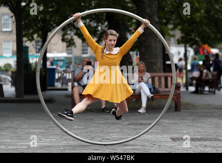 Aerial and contemporary circus performer Bev Grant from the Edinburgh Festival fringe show 'Heroes' performs a preview of her show which is running at the festival from 1st -26th August at the Udderbelly in George Square, Edinburgh. Stock Photo