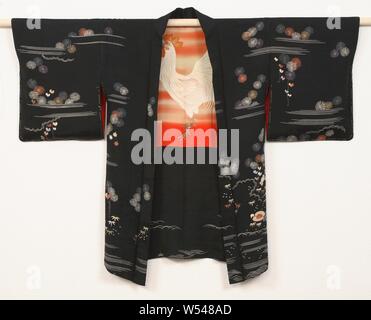 Women haori with night landscape and rooster, Haori for a woman with a decoration on the whole surface of a representation of an ox cart and two boxes for the shell game, in a nocturnal landscape with flowers, water, rocks and pine motifs, the lining of a crowing rooster in the dawn against a red background, referring to saying goodbye to the border post at Osaka, where lovers were secretly meeting each other. The Pillow Book of Sei Shonagon: 'There may be some who are cheated by the crowing of the rooster that falsely breaks the silence of the night, but that deception will not apply to Stock Photo