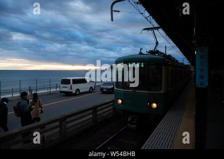 A Train On The Enoden Line Enters The Kamakura Koko Mae Station By The Sea In Kamakura Kanagawa Japan 24 December 18 Along The Enoden Local Li Stock Photo Alamy