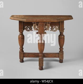 Three-legged table, Three-legged oak table with an octagonal folding leaf, connected on three slender vase legs by a T-shaped cross. The legs have houses that are fluted above, below, as well as the lines, adorned with flat chain ornament. One of the side legs is sawn vertically and rotatable as support for the fold-out leaf. The support pieces are cut away., anonymous, Netherlands, 1600 - 1650, wood (plant material), oak (wood), h 76 cm × w 94.5 cm × d 87 cm × w 17 kg Stock Photo