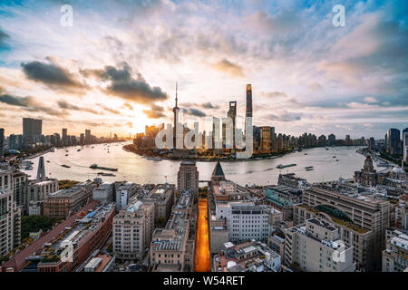 A panoramic view of the Bund along the Huangpu River in Puxi and the Lujiazui Financial District in Pudong with the Shanghai Tower, the Shanghai World Stock Photo